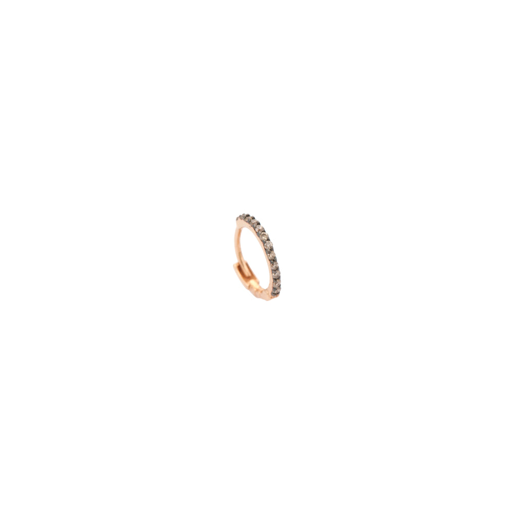 Tiny hoop piercing in cognac diamond